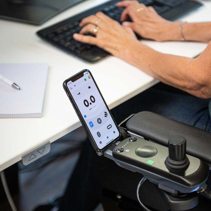 Control console of the Scewo BRO power wheelchair folded to the side